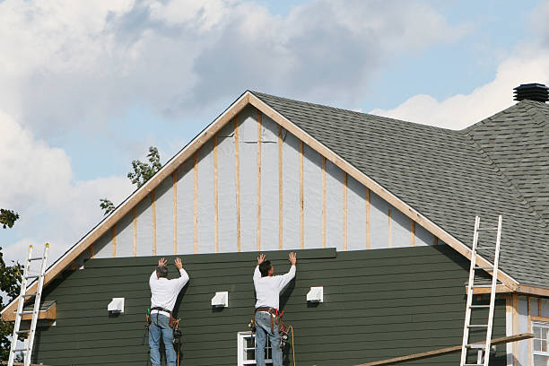 Professional Siding technician working in Newport, KY